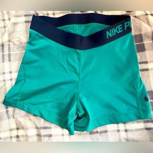 Womens Nike Pros. Blue-green dri-fit shorts. Size small